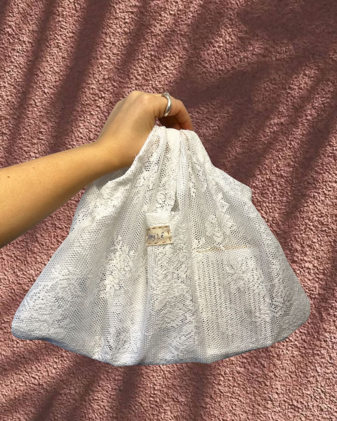 draped handsewn bag