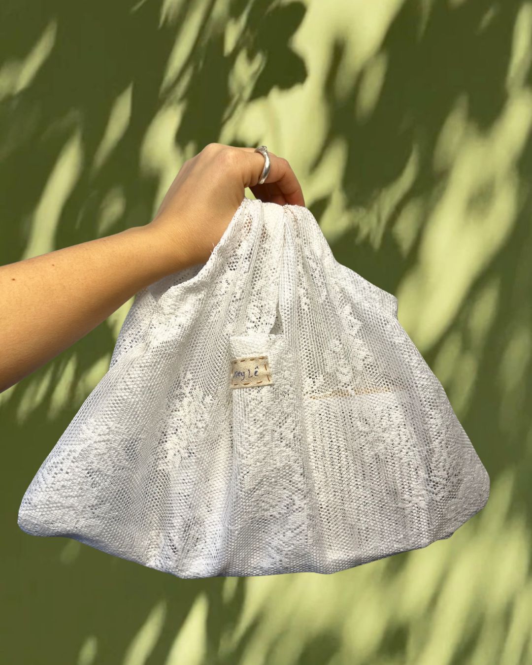 draped handsewn bag