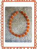 orange recycled pearls