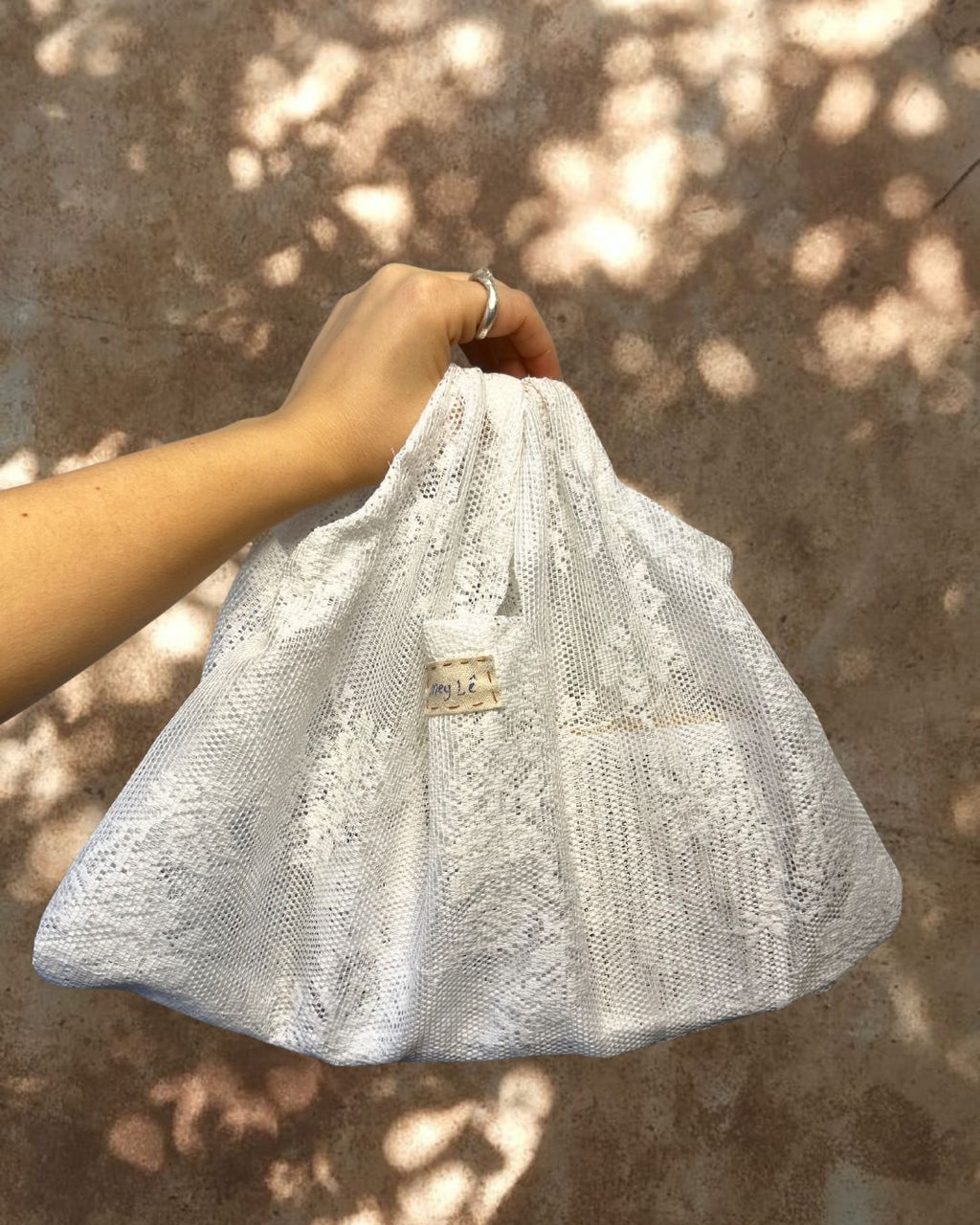 draped handsewn bag